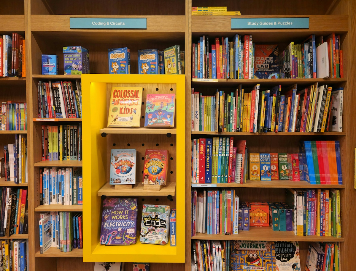 A library shelf filled with colorful books